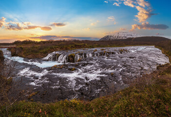 Picturesque waterfall Bruarfoss autumn view. Season changing in southern Highlands of Iceland.