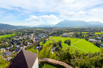 View of the city of Salzburg and the European Alps from the hilltop medieval Hohensalzburg Fortress...