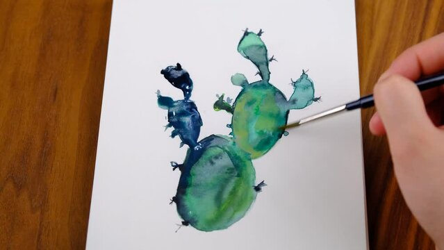 hand with brush painting