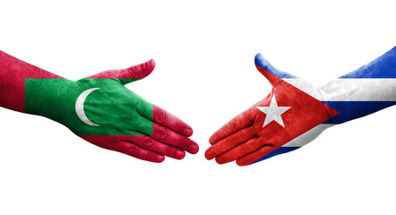 Handshake between Cuba and Maldives flags painted on hands, isolated transparent image.