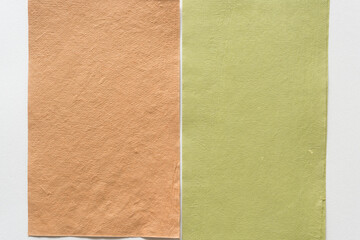 Fototapeta premium sand brown and paisley green paper 