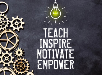 the inscription Teach inspire motivate empower. On the top notepad, the inscription - Teach Inspire...