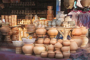 Fototapeta na wymiar Clay pots stacked for sale at a pottery-making village Stay at , Ban Chiang,Thailand.