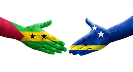 Handshake between Curacao and Sao Tome and Principe flags painted on hands, isolated transparent image.