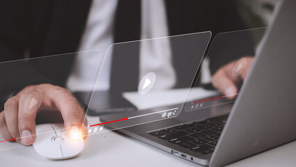 man using mouse and keyboard for streaming online, watching video on internet, live concert, show or tutorial