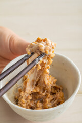 箸で混ぜて糸ひく納豆・natto