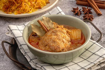 Massaman Curry with Chicken and Potatoes.It is an aromatic curry with a tangy, sweet and isn't as spicy.
