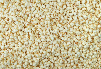 Popcorn filling entire frame. Endless Popcorn. Popcorn for the movies and the cinema. Popcorn for the movie theater.