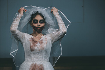 Portrait of asian woman make up ghost bride death and blood the horror is darkness scary horror...
