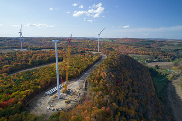 Aerial view of wind turbines in New York state during autumn time. Fall time in the USA, view from drone.