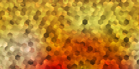 Light pink, yellow vector texture with colorful hexagons.