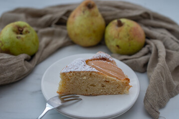 sweet home made pear almond pie on a table