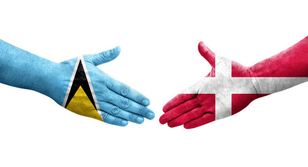 Handshake between Denmark and Saint Lucia flags painted on hands, isolated transparent image.