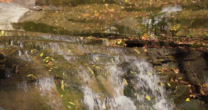 Autumn video of a scenic waterfall located in Lansing NY, Emilie Jonas Nature Falls Trail, near Ithaca, New York.	