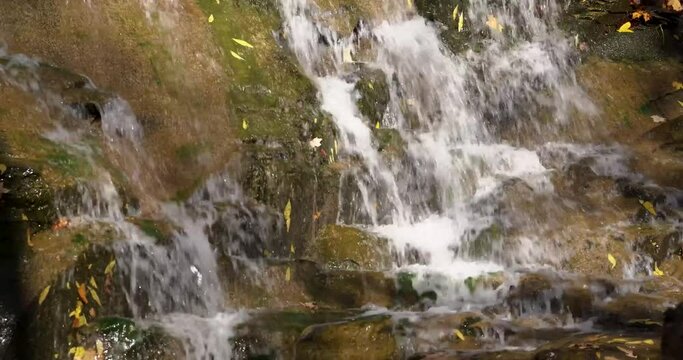 Autumn video of a scenic waterfall located in Lansing NY, Emilie Jonas Nature Falls Trail, near Ithaca, New York.