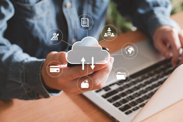 Selective focus at the icon and smartphone that holding by people who using internet and personal cloud storage to keep information and payment data, upload over the internet.