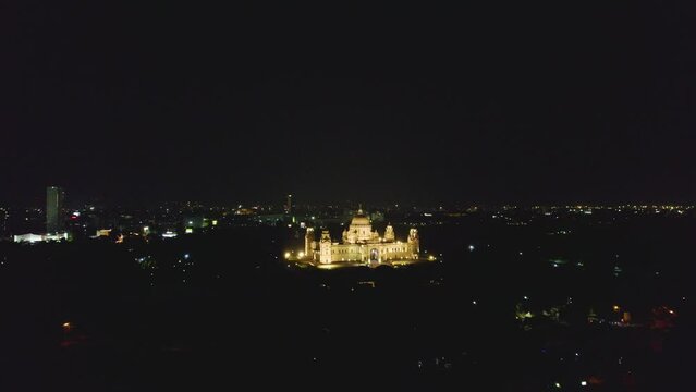 Aerial view of The Victoria Memorial during night, a large marble building in Central Kolkata, West Bengal, India