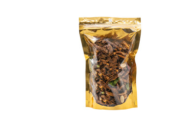 Small crispy small fish fried with herbs and cereals in golden packaging with front cleared plastic, blank space for branding design label, isolated package on white background, clipping path in file