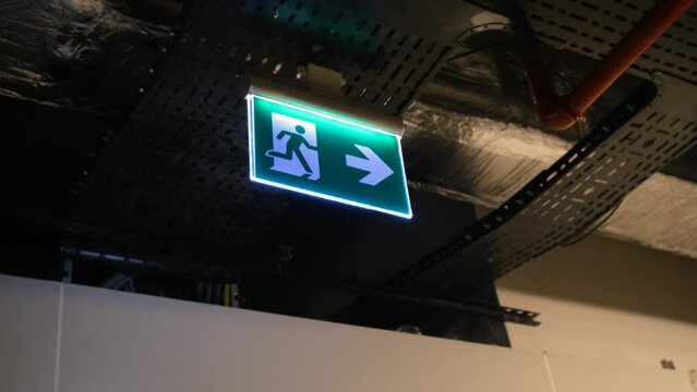 emergency exit sign on the door