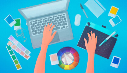 Hands typing text on the laptop keyboard. The workplace is on top. Drawing tablet, pantone colors, color circle.