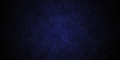 Fototapeta premium Dark blue stone grunge concrete cement blackboard chalkboard wall floor texture. Black anthracite dark blue grunge old texture panorama backdrop background. 