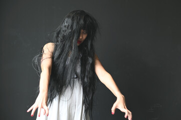 Happy Halloween day in Scary ghost woman. Asian ghost or zombie horror creepy scary have hair...
