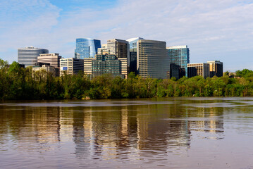 Fototapeta na wymiar Cityscape of Washington DC, View of office buildings with Potomac River in foreground, city skyline 