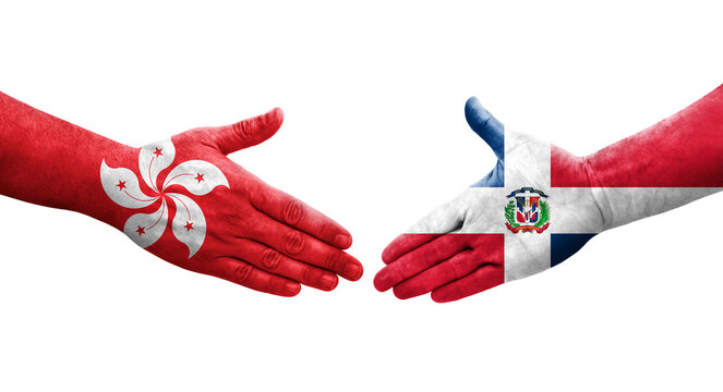 Handshake between Dominican Republic and Hong Kong flags painted on hands, isolated transparent image.