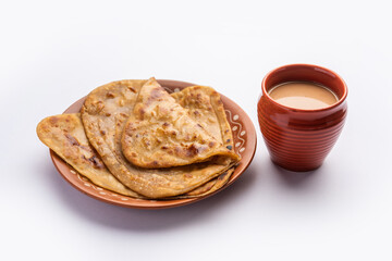Chai Paratha - Hot Tea served with Flatbread is a traditional simple meal from India and Pakistan