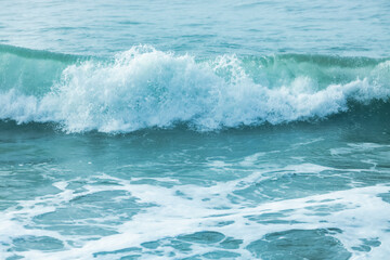 Beautiful waves of the Pacific Ocean, close-up, pastel colors