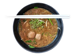 Chopsticks put on a bowl of jade noodles. isolate white background.