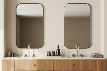 Light bathroom interior with double sink and mirror, accessories