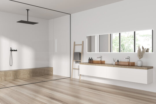 Light stylish bathroom interior with double sink and douche with window