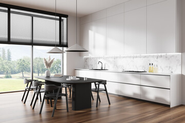 Modern kitchen interior with dining table and seats, panoramic window