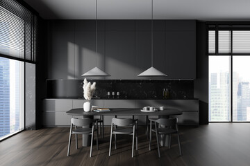 Grey kitchen interior with eating table and seats, panoramic window