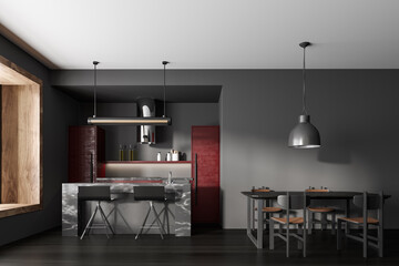 Grey kitchen interior with bar countertop and dining table, panoramic window