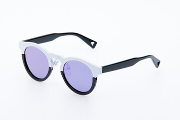 Fashion sunglasses black and white frames on white background.