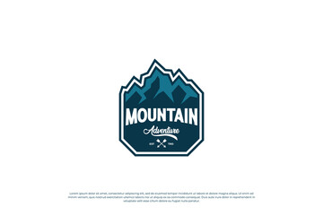 Obraz premium Mountain exploration logo design. Mountain travel emblem. Mountain expedition adventurer.