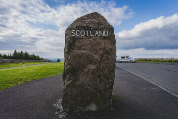 The boundary stone on Scotland and England Border south of Jedburgh Cheviot Hills main A68 road...