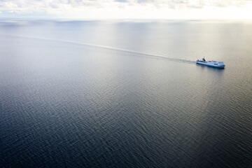 Cargo ship transporting containers in the ocean