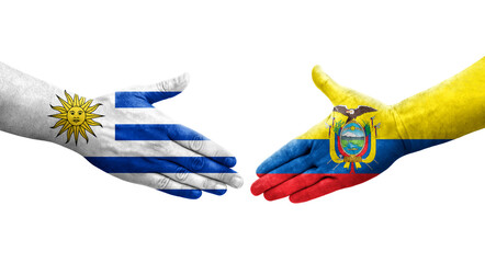 Handshake between Ecuador and Uruguay flags painted on hands, isolated transparent image.