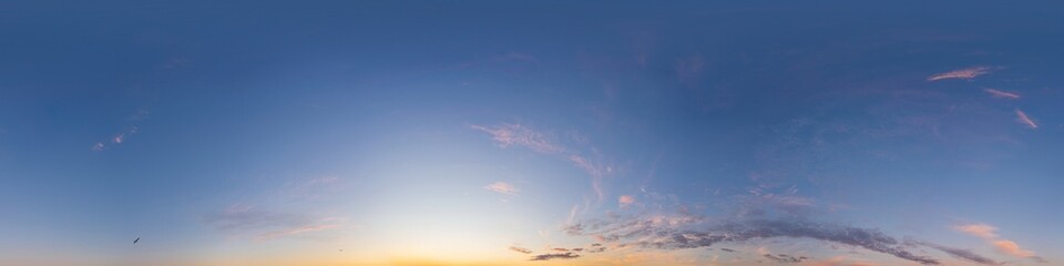 Dark blue sunset sky panorama with pink Cirrus clouds. Seamless hdr 360 panorama in spherical equirectangular format. Full zenith for 3D visualization, sky replacement for aerial drone panoramas.