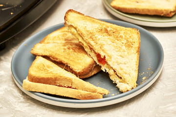 freshly baked delicious sandwiches in a sandwich box and on a plate