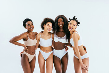 Black african beautiful women wearing underwear lingerie posing in studio for beauty, skin care, body care, body acceptance and diversity concepts