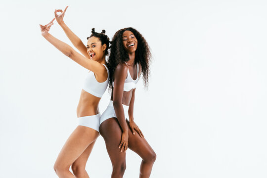 Black african beautiful women wearing underwear lingerie posing in studio for beauty, skin care, body care, body acceptance and diversity concepts