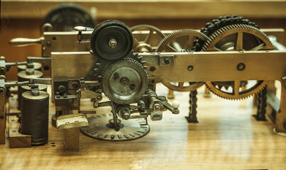 An old brass mechanism with gears. The mechanism of the telegraph apparatus of the last century.