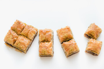Baklava on a white background. Confectionery products. Oriental sweets.