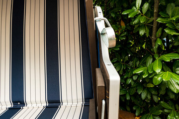 Beach chair white blue frontal half with text space