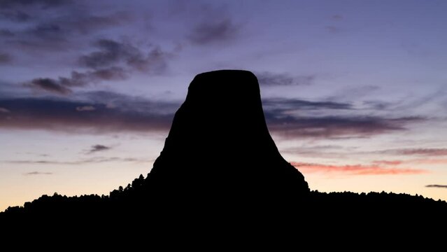 View Of Devils Tower in Silhouette at Twilight, Time Lapse with Colourful Sky, USA