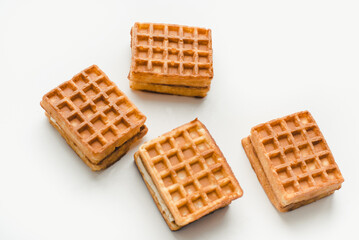 Confectionery products. Waffles on a white background. Soft waffles on a white background.